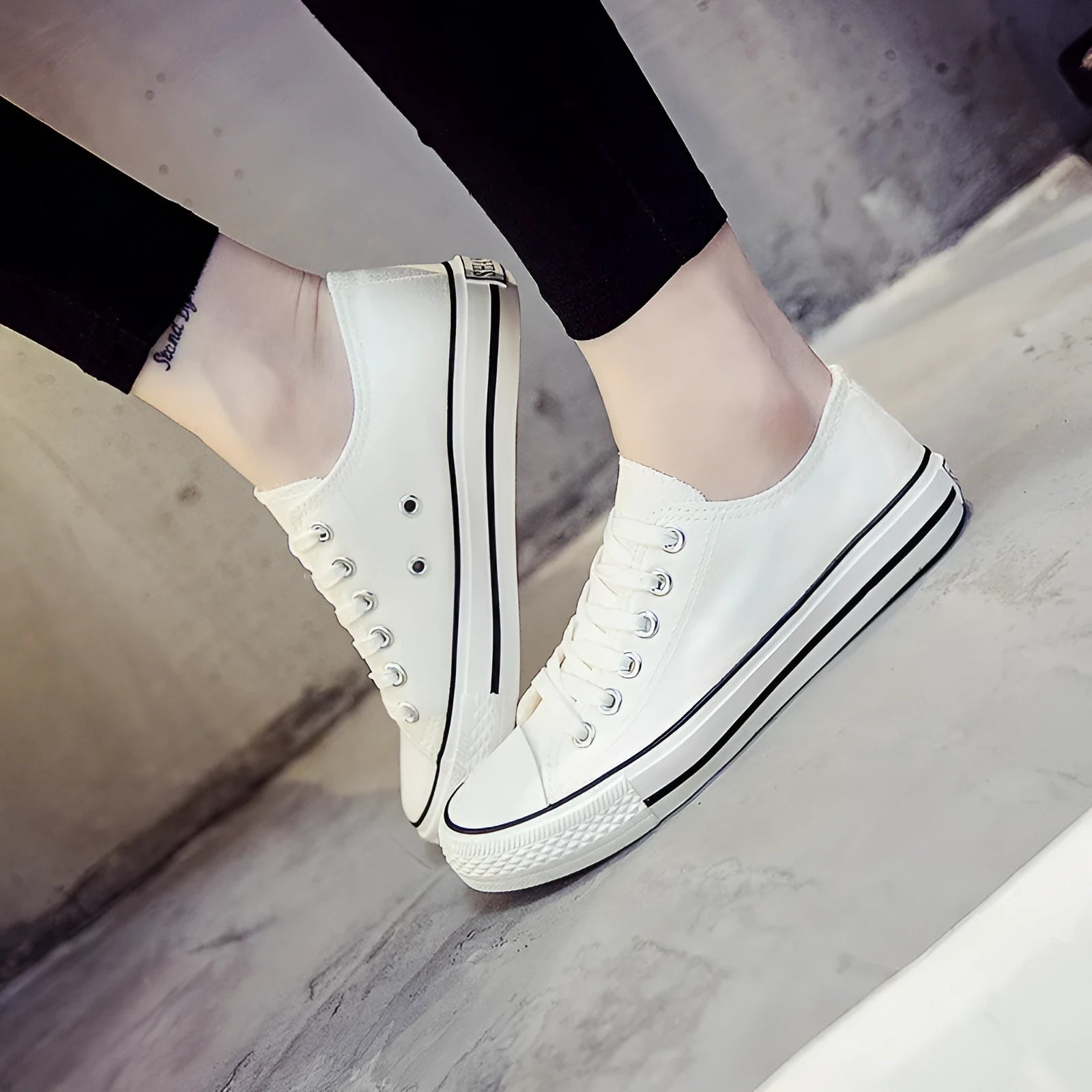 Women's solid colour canvas casual shoes on a plain background, showing the simple design.