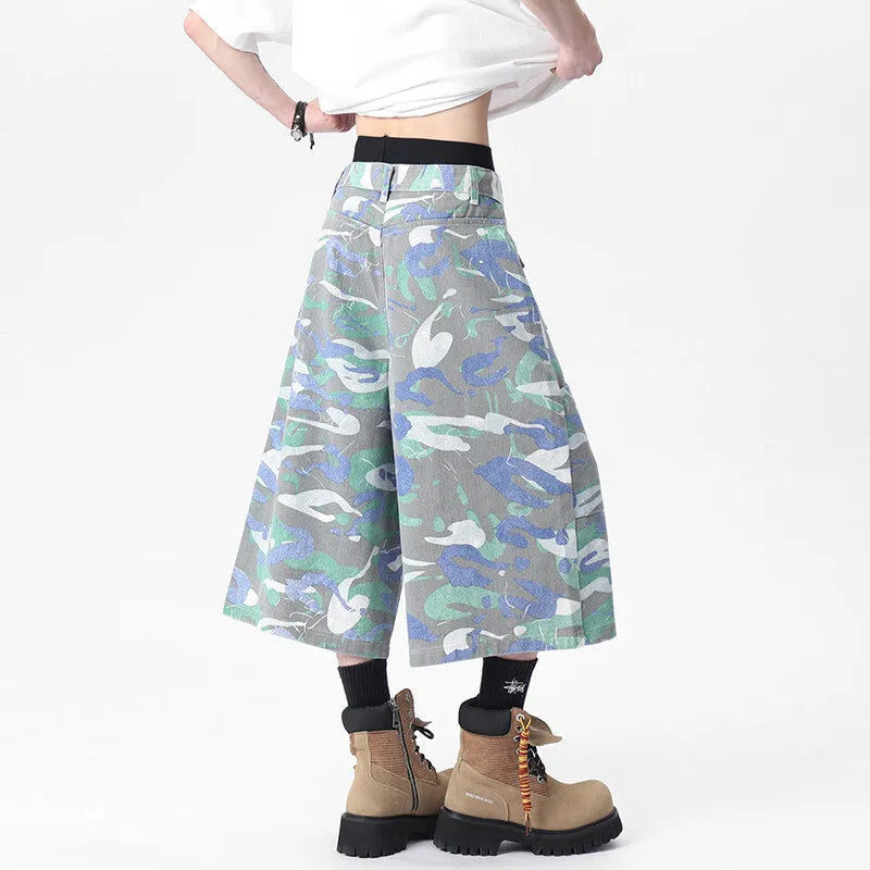 Cotton denim camouflage trousers with straight leg cut and large front pockets