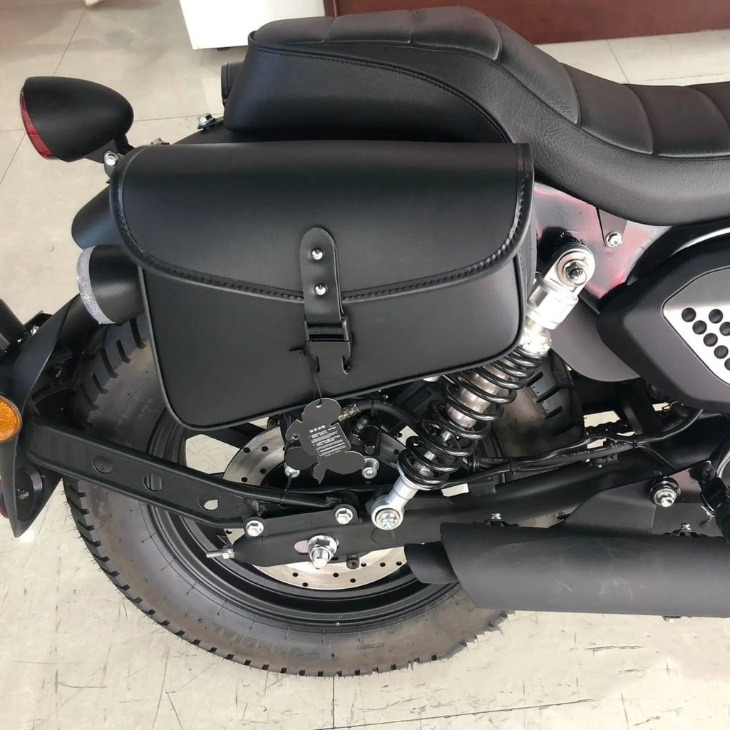Black PU leather motorcycle swingarm bag mounted on Harley Sportster side