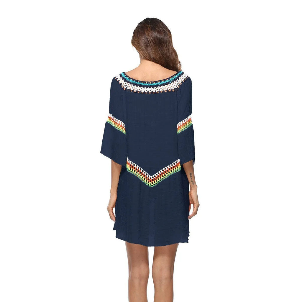 Crocheted ethnic-style beach cover-up for women in apricot colour, made from acrylic fabric.