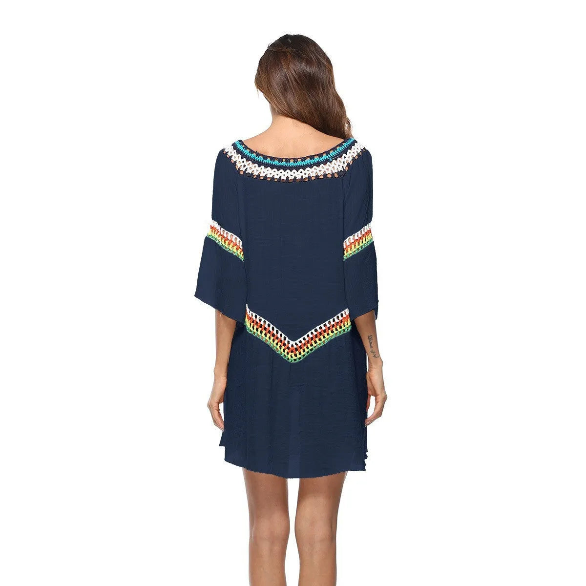 Crocheted ethnic-style beach cover-up for women in apricot colour, made from acrylic fabric.