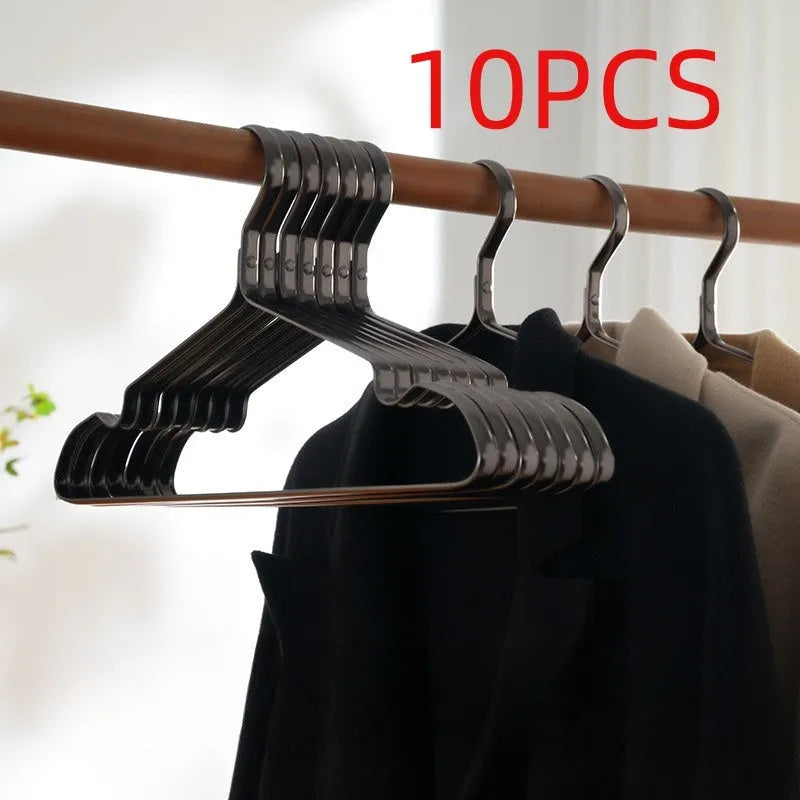 Black plastic clothes hangers with non-slip anti-rust coating for wardrobe organisation