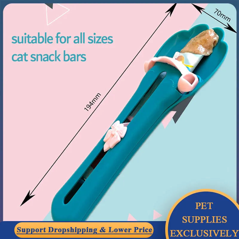 Green and pink pet feeding spoon with extrusion design for liquid food and snack dispensing