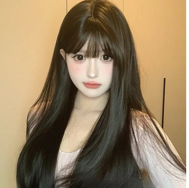 Dark brown long straight synthetic wig with fringe for round face shapes on wig head