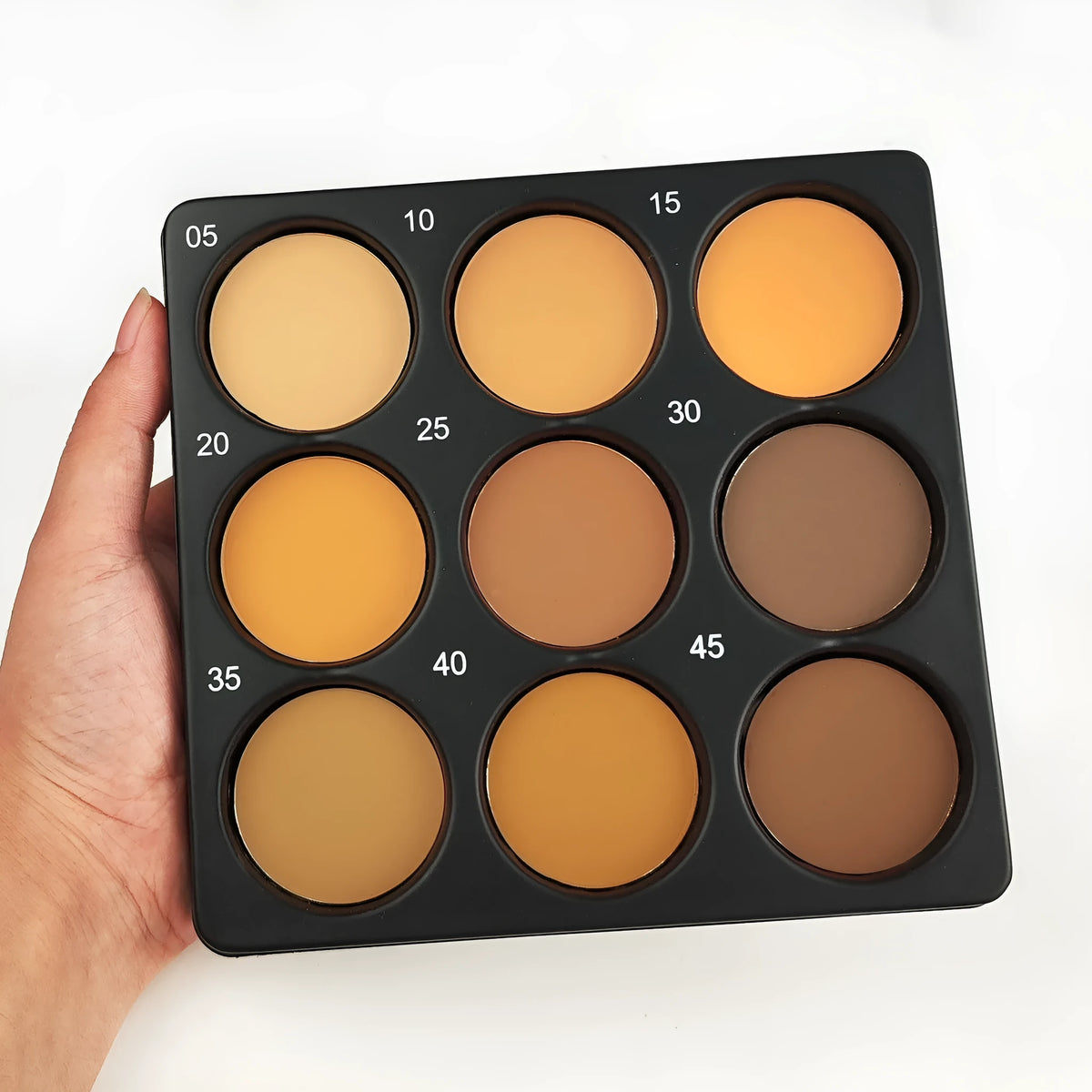 Dark matte makeup palette with nine waterproof colours in repair disk case