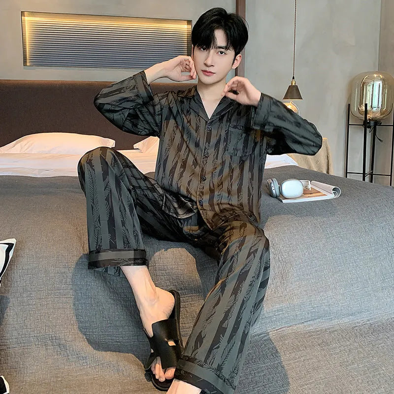 Men's black stripes ice silk pajama set showing V-neck long sleeve top and thin trousers for summer wear