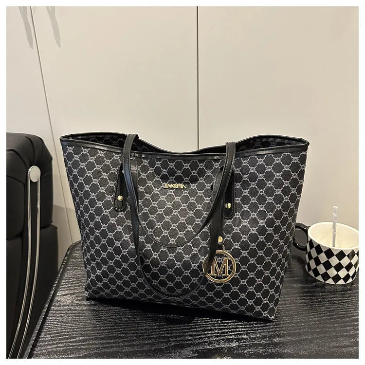Western style shoulder bag in PU leather with sewing thread detail showing black colour option
