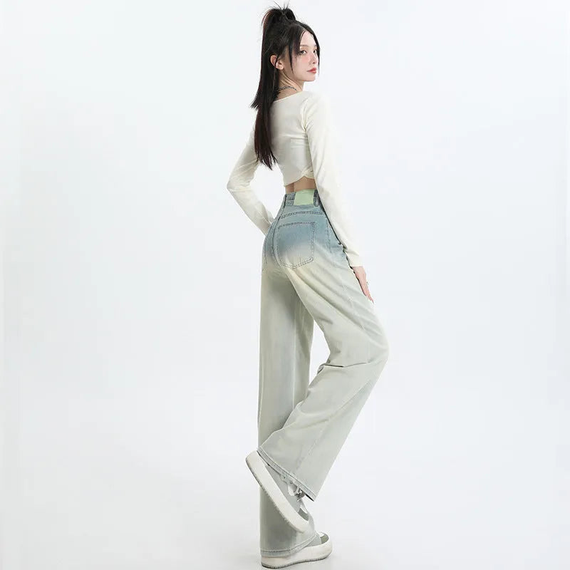 Women's straight-leg denim trousers in a gradient blue colour with a wide leg fit.