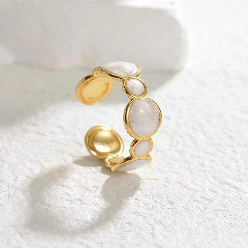 Stainless steel geometric ring with adjustable opening and electroplated finish