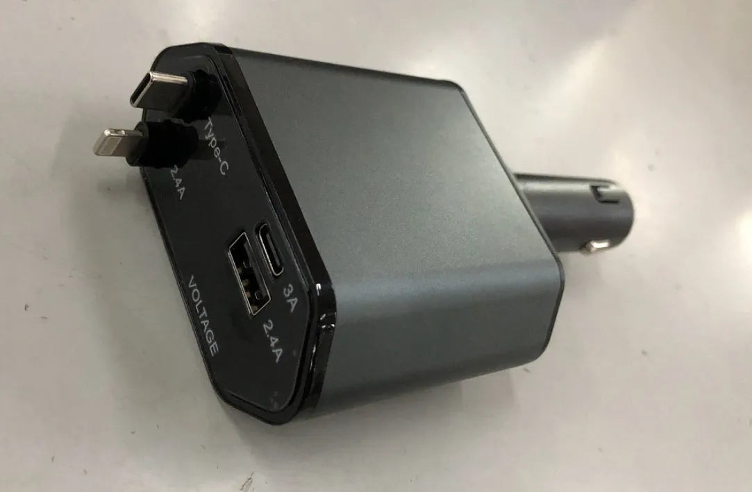 Automatic retractable car charger with USB ports plugged into a vehicle cigarette lighter socket.