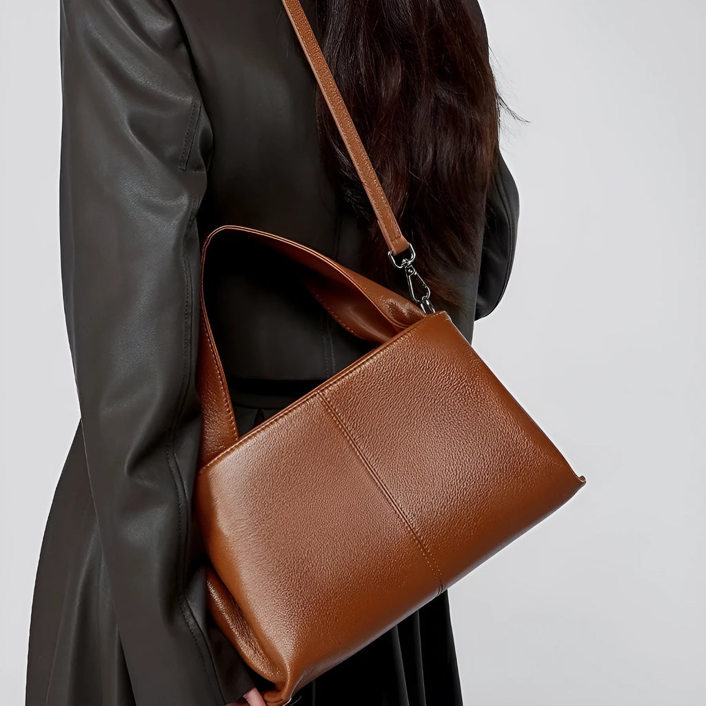 First layer cowhide messenger bag in horizontal square shape with double joint strap and retro texture in solid color