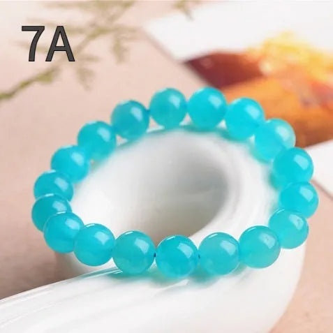 Natural Grade 7A Amazonite scattered beads showing 5A Ice and 7A Ice colour options in various sizes from 6mm to 13mm.