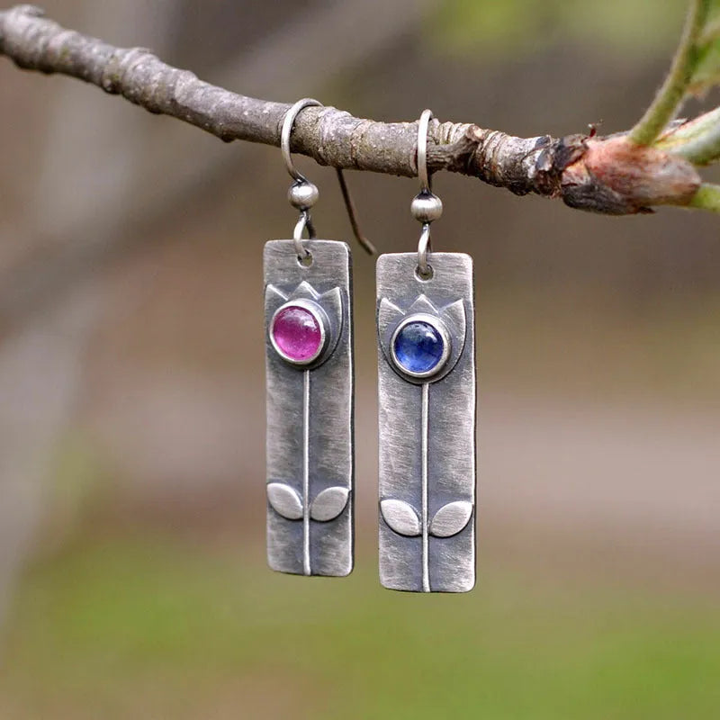 Antique finish red sapphire earrings with geometric ellipse design in retro style