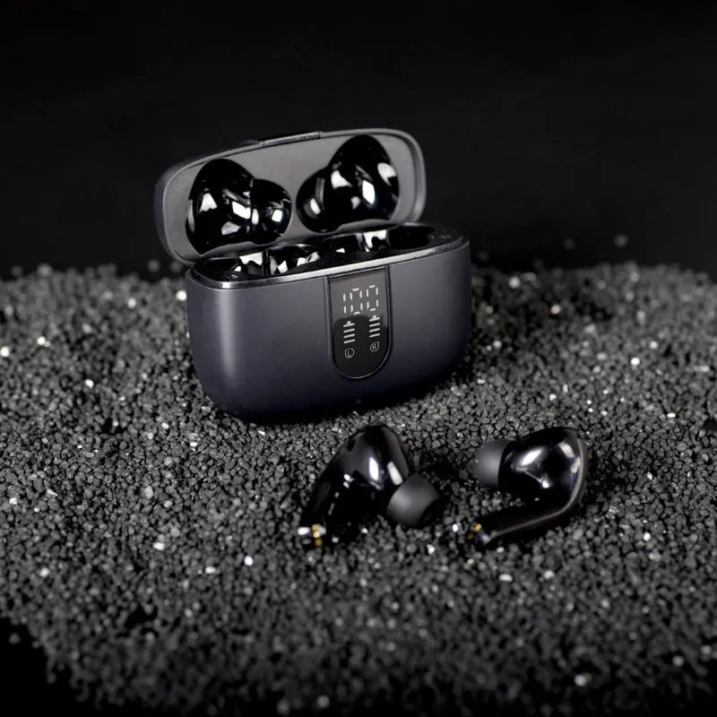 Jerry X08 wireless headphones in black with digital display charging case showing battery percentage