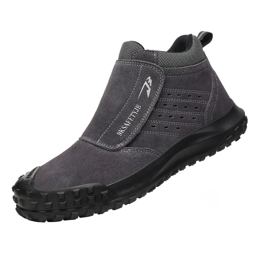 Lightweight welder labour protection shoes with steel toe cap in sand colour on a workbench.