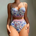 Blue women's high-waist bikini with push-up top and adjustable straps.