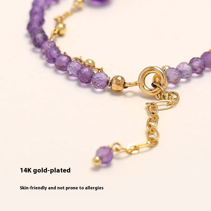 Amethyst-coloured crystal bracelet with diamond-shaped elements in Chinese style design