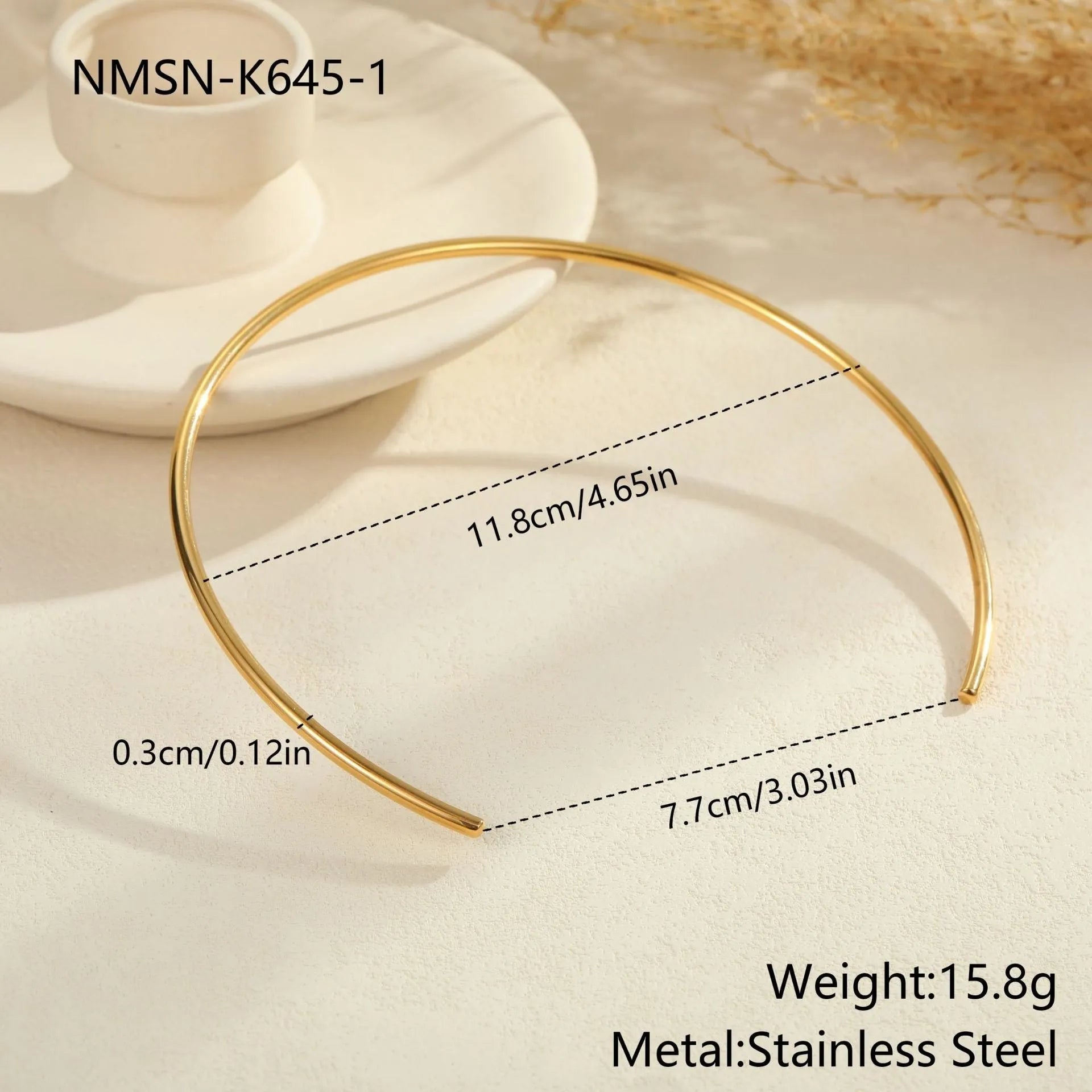 Stainless steel rope necklace with irregular geometric pendants in gold or silver electroplated finish