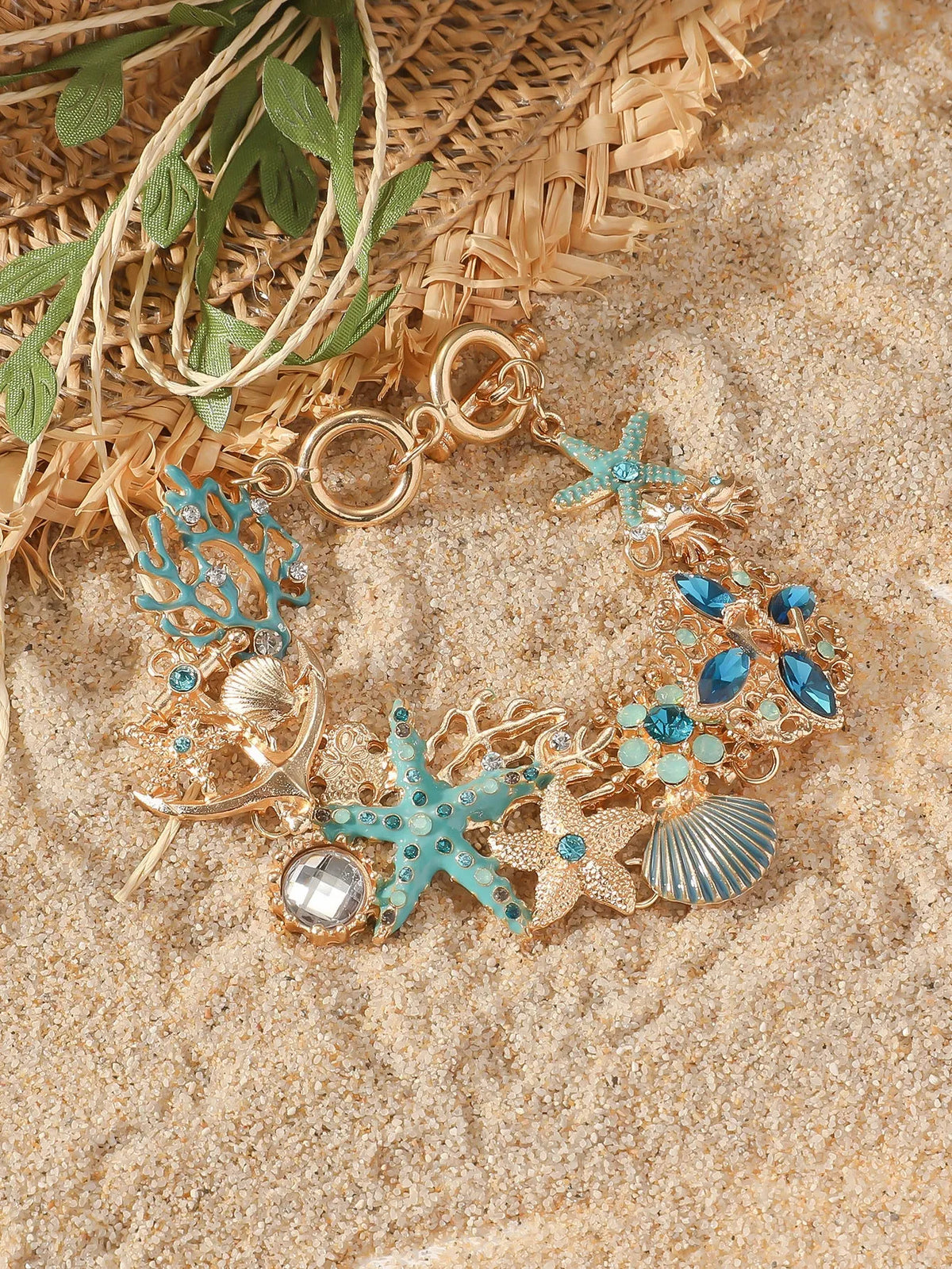 Women's alloy rhinestone bracelet featuring marine anchor and starfish design in coastal colours