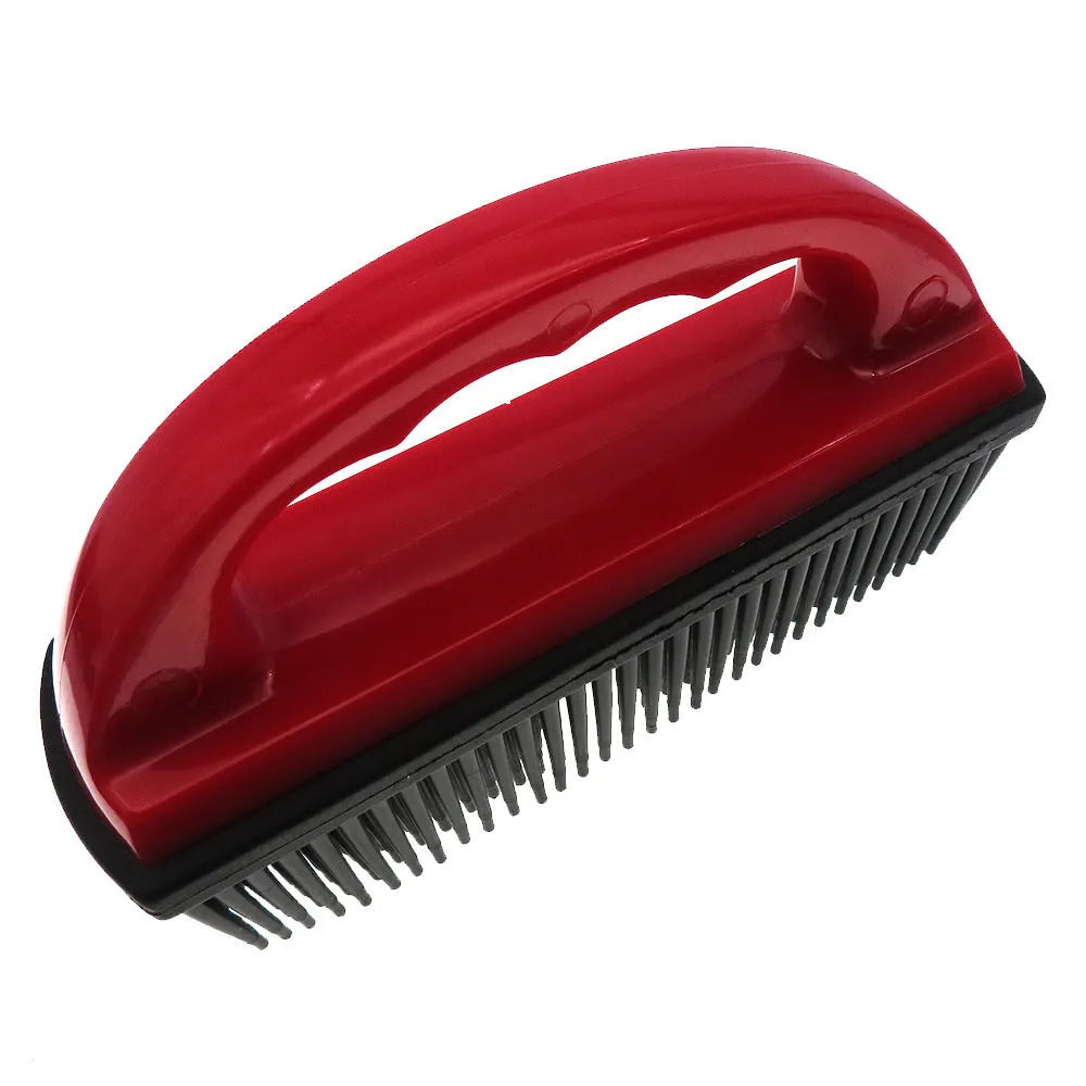 Red pet hair removal brush with silicone bristles and ergonomic handle on a white background.
