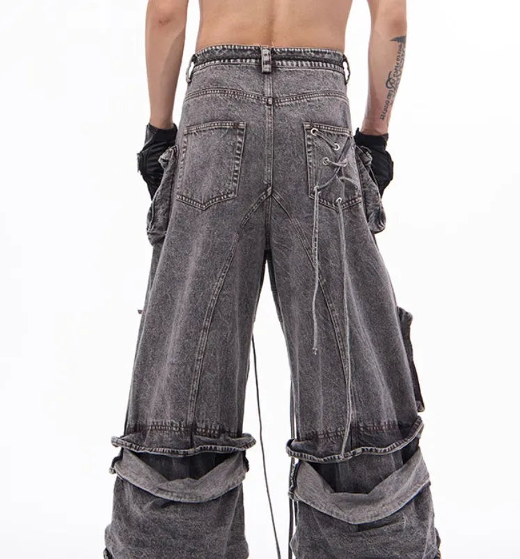 Women's grey distressed denim overalls with mop pant silhouette and rope stitching details