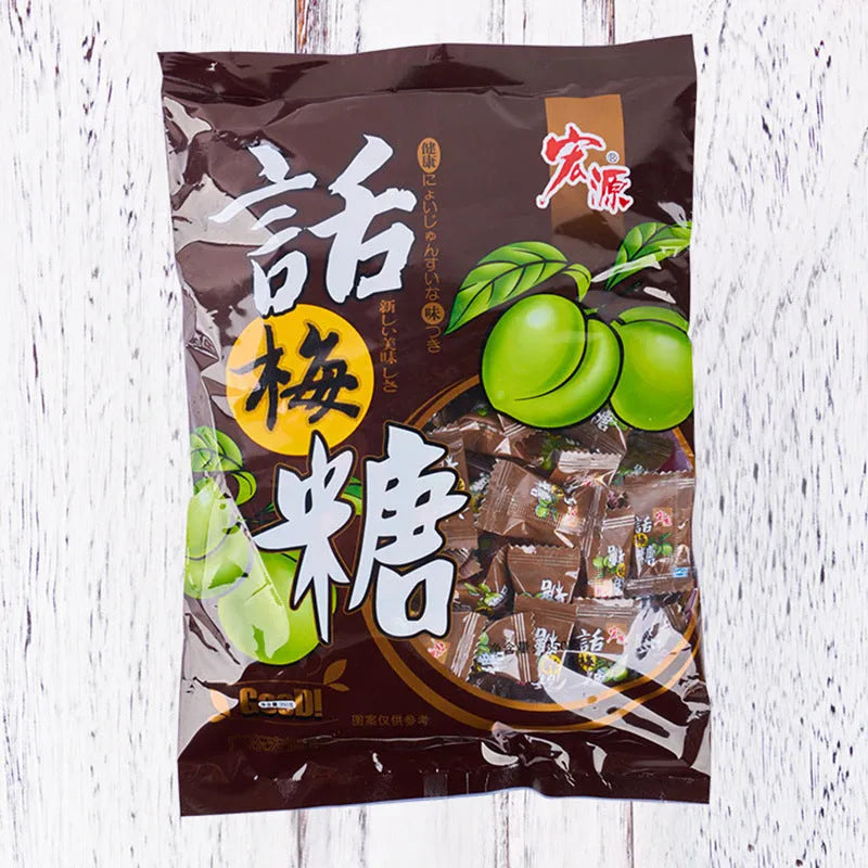 Three bags of hard candy in guava, plum, and tangerine peel flavours with net weights displayed