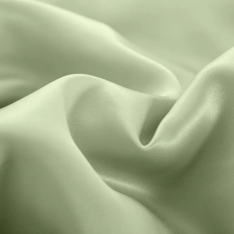 Solid colour silk duvet cover laid flat, showing double-sided plain weave fabric in one of six available colours.