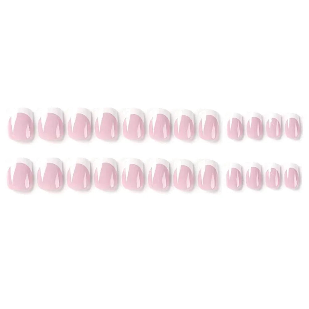 24 white fake nails with a black and grey plaid pattern, laid out as press-on nail tips.