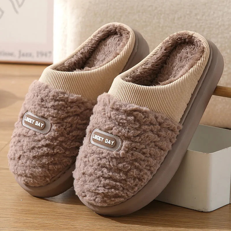 Men's grey and brown plaid winter slippers with rabbit hair upper and thick sole.