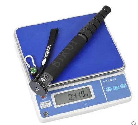 Black carbon fibre SLR camera monopod extended to maximum 1540mm height