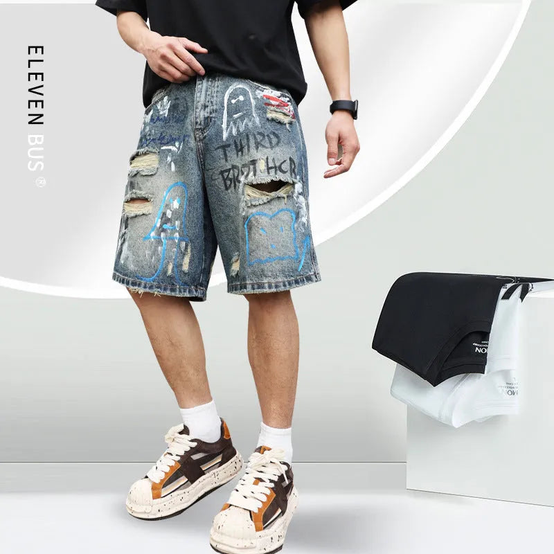 Blue men's ripped denim shorts with a straight leg cut and zip fly front.