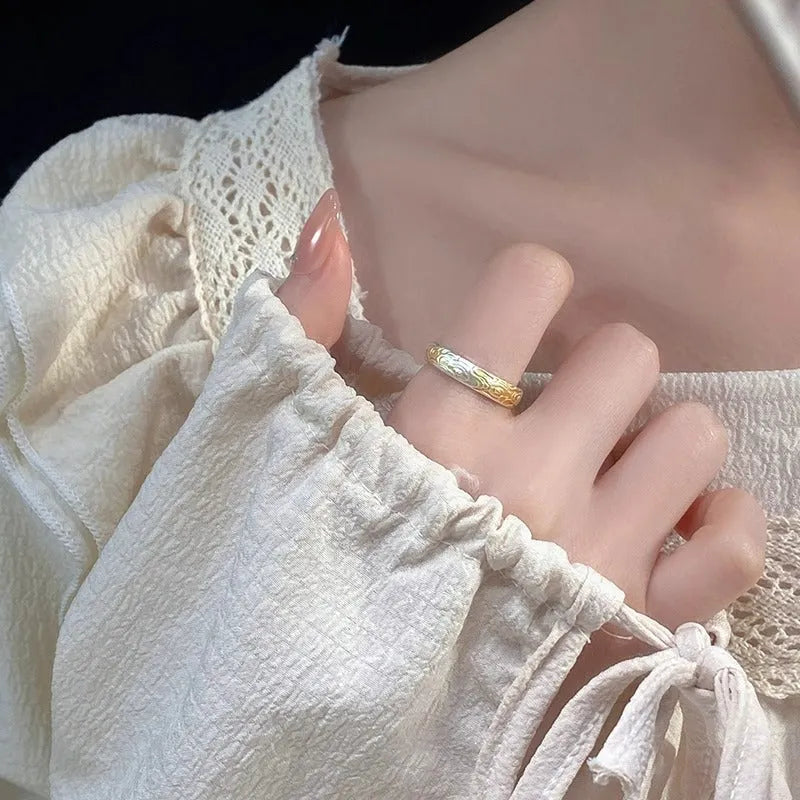 Adjustable open-mouth ring with geometric Xiangyun pattern in silver gold electroplated finish on white copper.