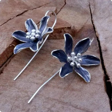 Purple flower-shaped alloy earrings with electroplated finish and retro design