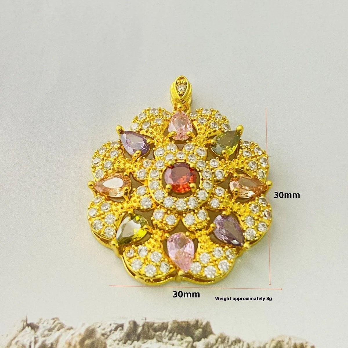 Close-up of a women's flower-shaped zircon pendant necklace in a gold colour finish on a chain.