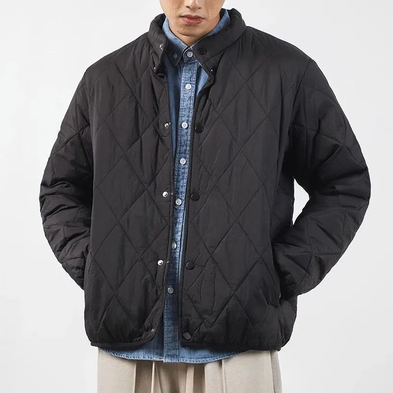 Men's black diamond lattice pattern cotton-padded winter jacket with a lengthened loose fit.
