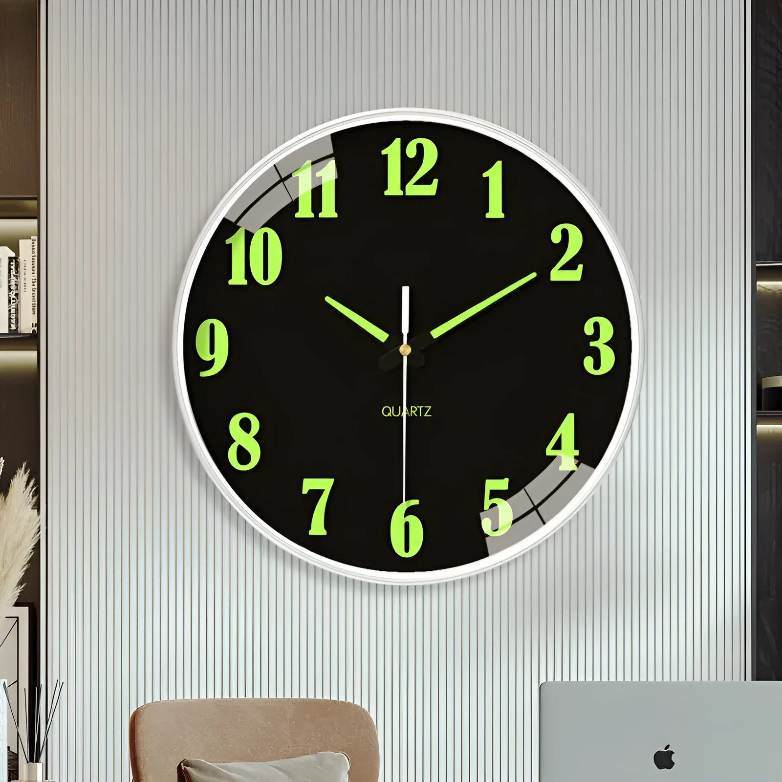 Modern 8-inch luminous wall clock with white plastic case on a wall.