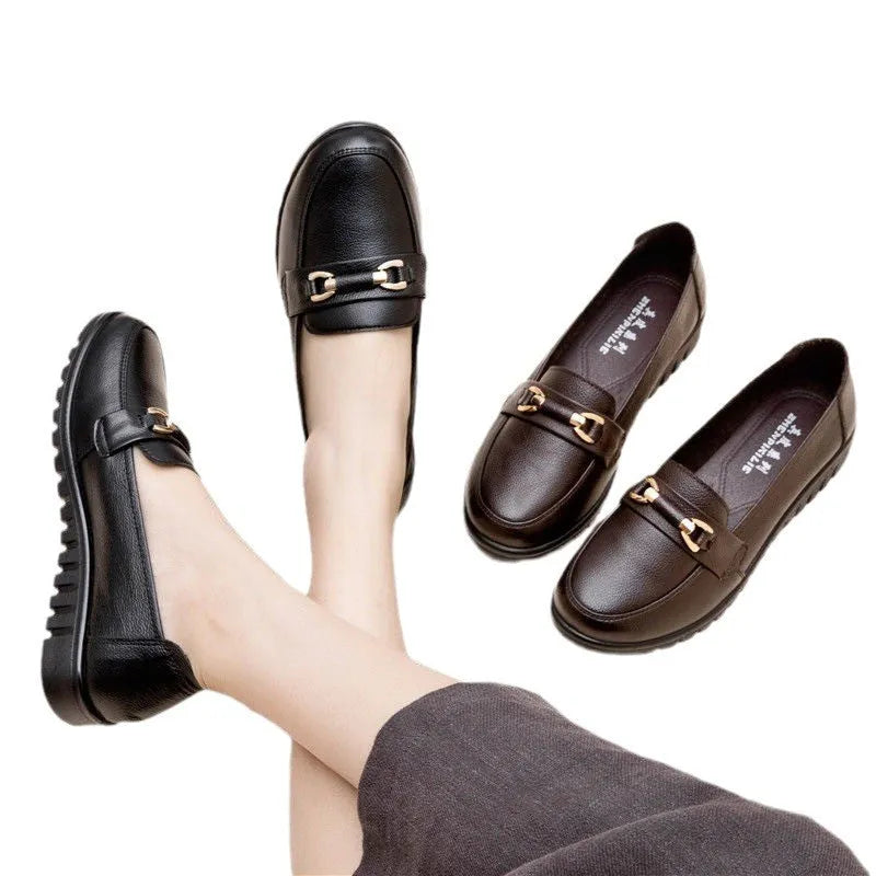 Black casual pumps with soft rubber sole and microfibre upper, shown on a plain background.