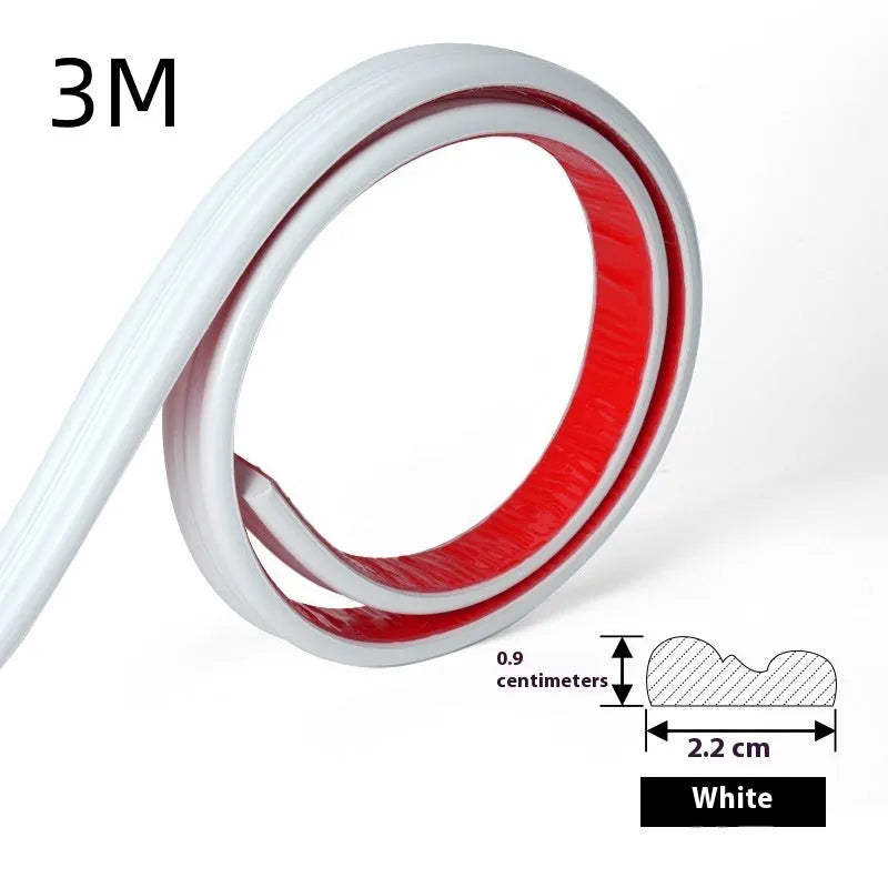 Flexible PVC self-adhesive backdrop edge trim in black, gold, silver, and white on a white surface