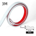 Flexible PVC self-adhesive backdrop edge trim in black, gold, silver, and white on a white surface