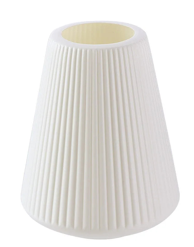 Melamine plastic decorative flower vase in four colours on desktop