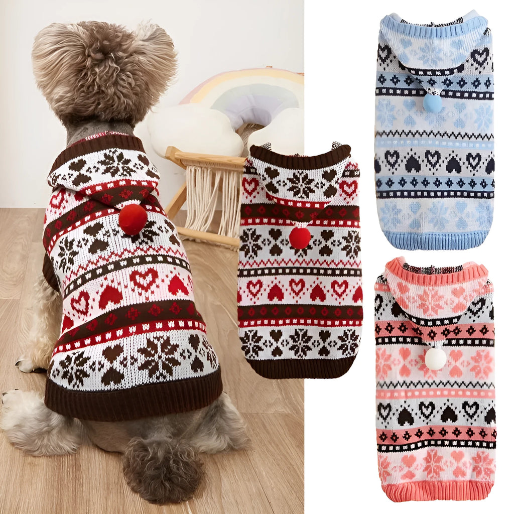 Pink knitted dog sweater with snowflake, love heart and stripe camouflage pattern on a small dog.