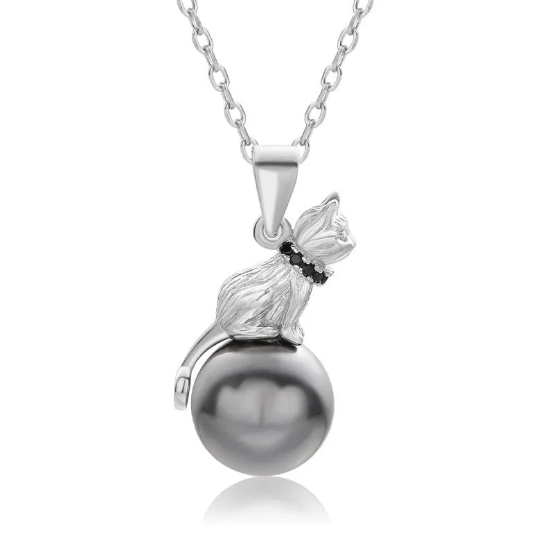 Sterling silver cat pendant necklace with adjustable chain, showing delicate feline silhouette charm