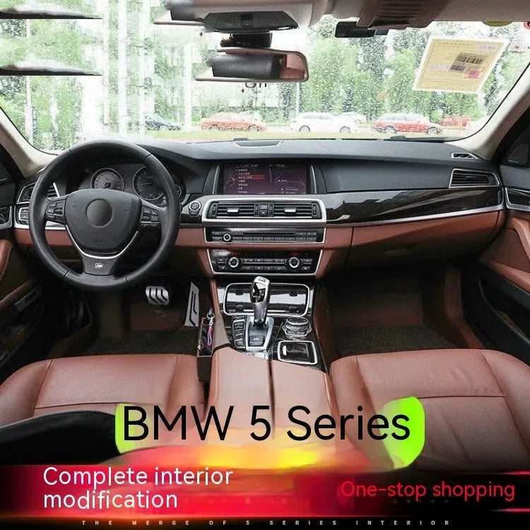 Set of four ABS stainless steel decorative strip stickers for BMW 5 Series interior door handles.