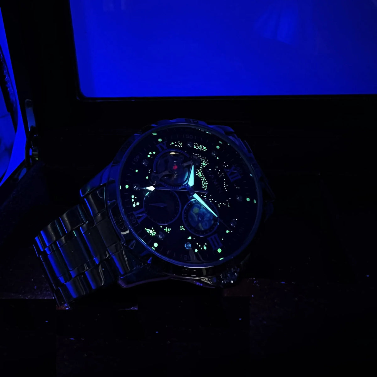Men's automatic mechanical watch with rose gold shell, black dial, large display, and 12mm thickness