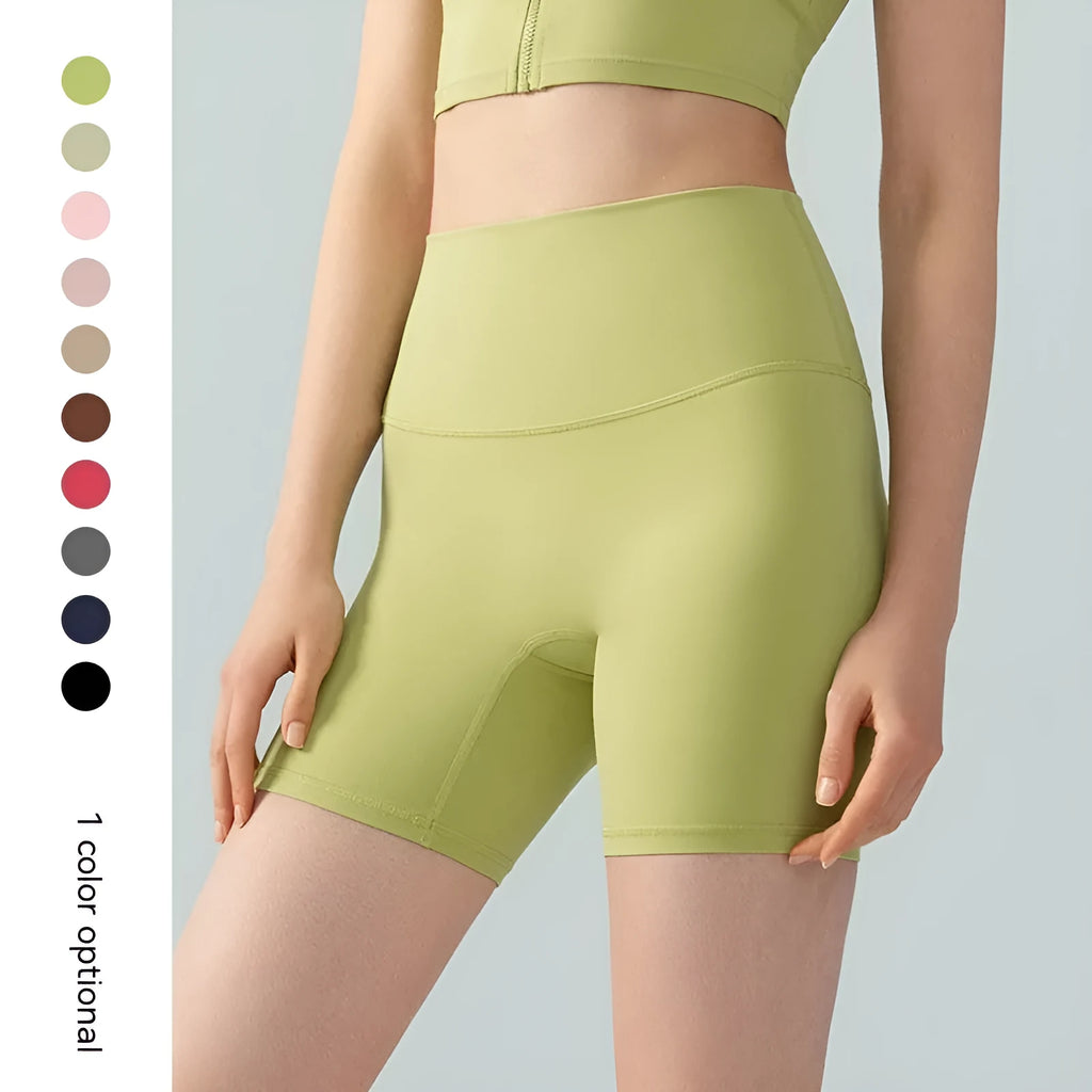 Women's high elastic yoga shorts in leaf green colour with high waist and anti-exposure design for summer workouts