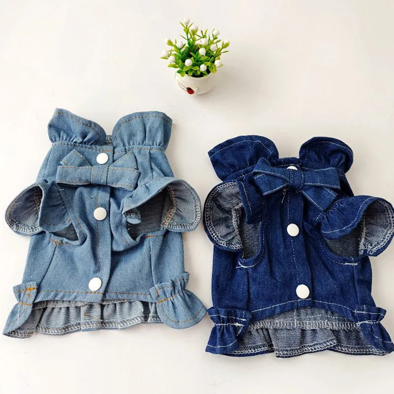 Blue denim pet dress with ruffles on the chest and a metal leash hook.