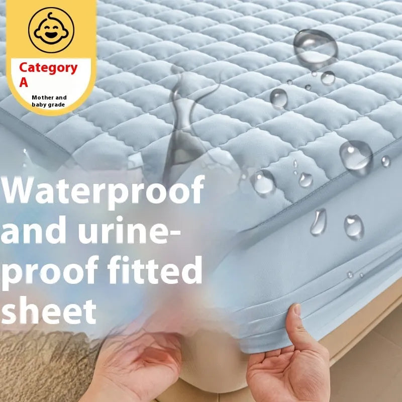 Blue washed cotton waterproof fitted sheet with elasticated corners on a mattress.