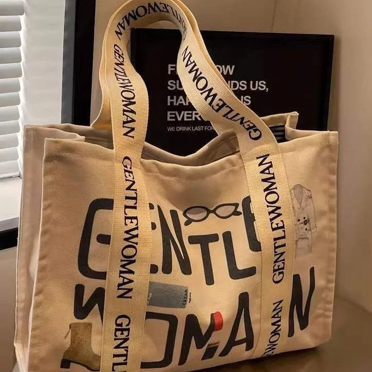 Canvas women's travel tote shoulder bag with printed design in large capacity format