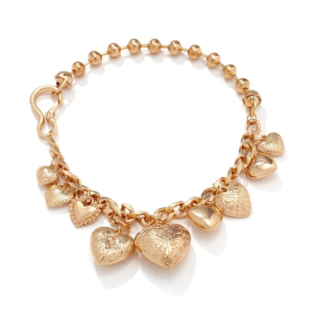 Carved heart pendant necklace in gold colour with adjustable chain length