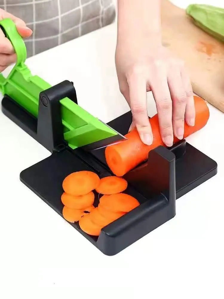 Green and red vegetable cutter with stainless steel blade for slicing carrots and potatoes